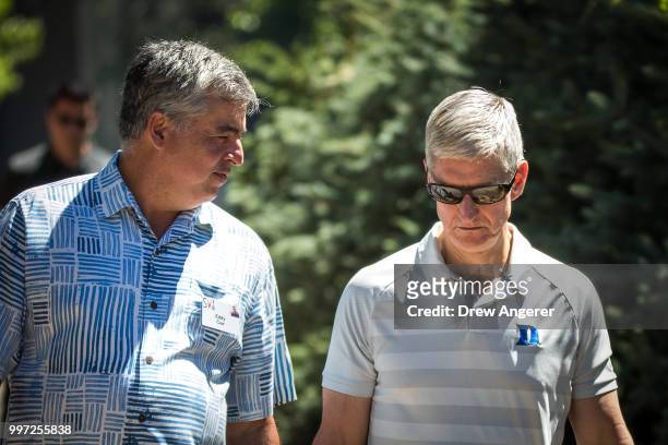 Eddy Cue, senior vice president of Internet Software and Services at Apple, and Tim Cook, chief executive officer of Apple, attend the annual Allen &...
