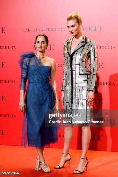 Adriana Herrera and Karlie Kloss attends Vogue 30th Anniversary Party at Casa Velazquez on July 12, 2018 in Madrid, Spain.