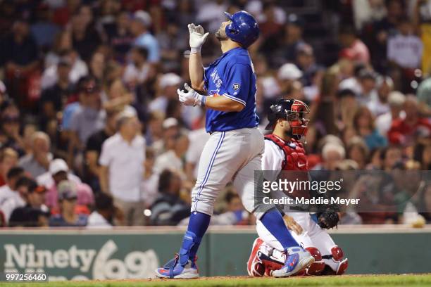 Kendrys Morales of the Toronto Blue Jays celebrates after hitting home run against the Boston Red Sox during the seventh inning at Fenway Park on...
