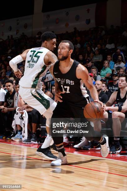 Trey McKinney-Jones of the San Antonio Spurs handles the ball against the Milwaukee Bucks during the 2018 Las Vegas Summer League on July 12, 2018 at...