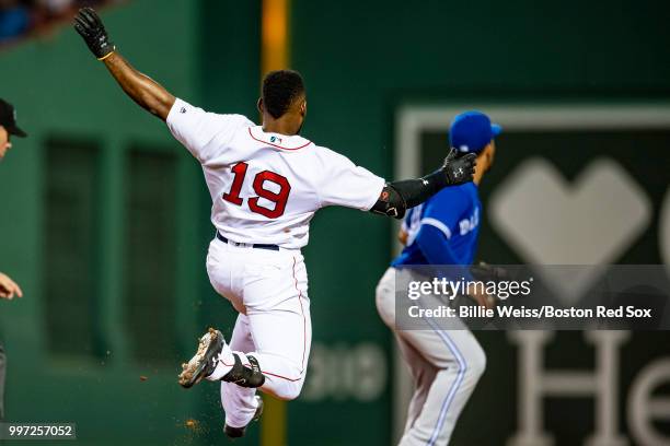 Jackie Bradley Jr. #19 of the Boston Red Sox steals second base during the seventh inning of a game against the Toronto Blue Jays on July 12, 2018 at...