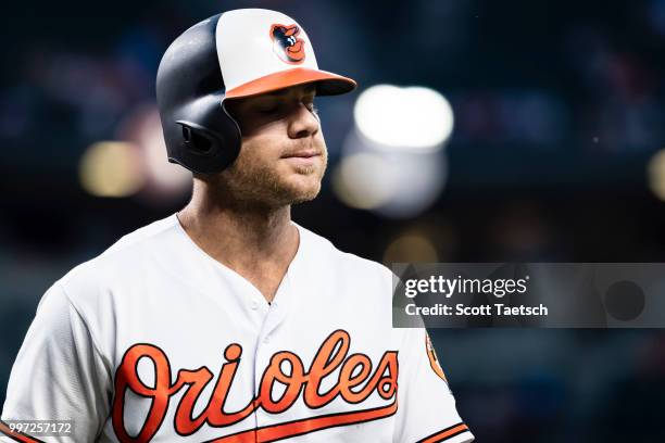 Chris Davis of the Baltimore Orioles reacts after striking out against the Philadelphia Phillies during the seventh inning at Oriole Park at Camden...