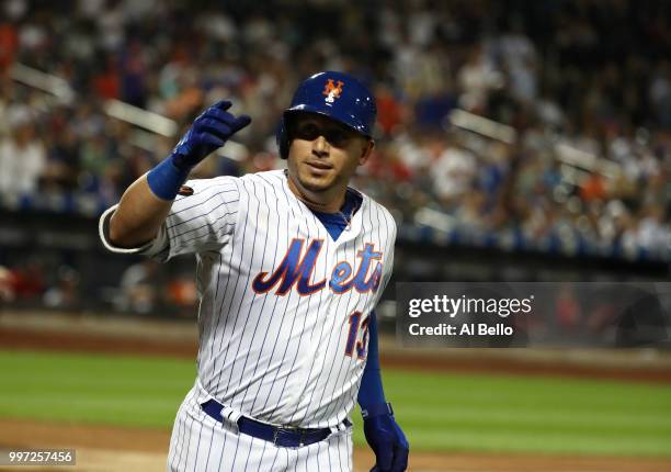 Asdrubal Cabrera of the New York Mets celebrates his eigth inning home run against the Washington Nationals during their game at Citi Field on July...