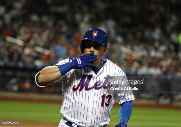 Asdrubal Cabrera of the New York Mets celebrates his eigth inning home run against the Washington Nationals during their game at Citi Field on July...