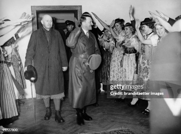 Adolf Hitler and Henri de Baillet-Latour, president of the IOC, on their arrival at the Olympic House. Photograph. 1936.