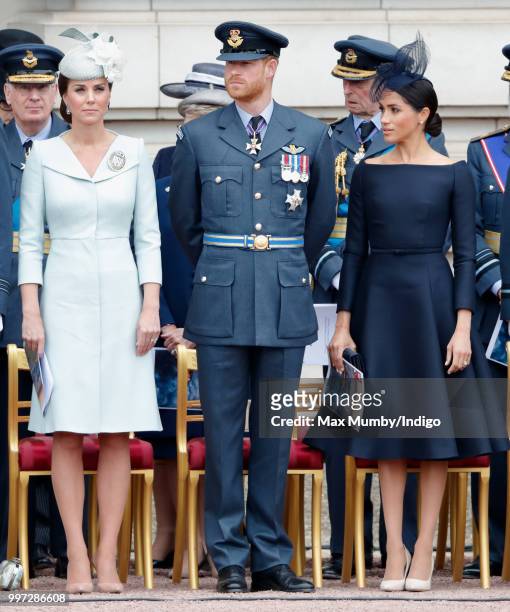 Catherine, Duchess of Cambridge, Prince Harry, Duke of Sussex and Meghan, Duchess of Sussex attend a ceremony to mark the centenary of the Royal Air...