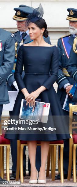 Meghan, Duchess of Sussex attends a ceremony to mark the centenary of the Royal Air Force on the forecourt of Buckingham Palace on July 10, 2018 in...