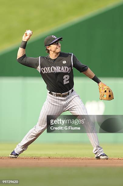 Troy Tulowitzki of the Colorado Rockies throws the ball to first base against the Washington Nationals at Nationals Park on April 22, 2010 in...