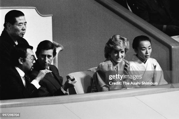 Prince Charles, Prince of Wales and Princess Diana, Princess of Wales enjoy sumo bouts with Prince Tomohito and Princess Nobuko of Mikasa at Ryogoku...