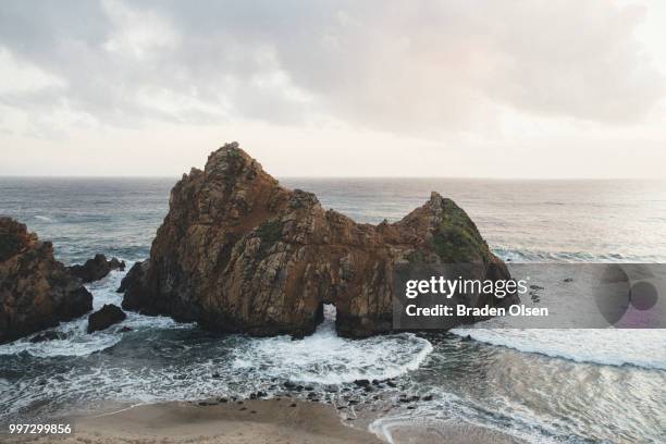 rocks on pfeiffer beach in california, usa. - olsen stock pictures, royalty-free photos & images