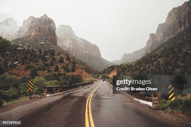 rainy morning drive in zion - olsen stock pictures, royalty-free photos & images