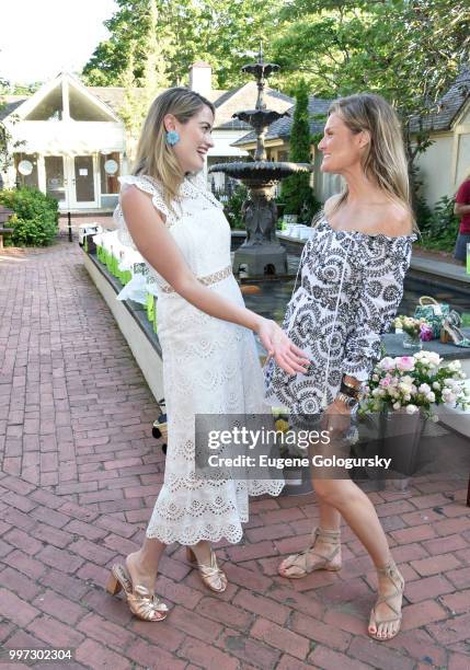 Sarah Bray and Lizzi Bickford attend the Modern Luxury + Sam Edelman Summer Fashion Event on July 12, 2018 in Southampton, New York.