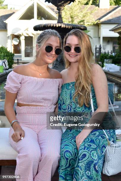 Olivia Milieu and Amelia Salvatore attend the Modern Luxury + Sam Edelman Summer Fashion Event on July 12, 2018 in Southampton, New York.