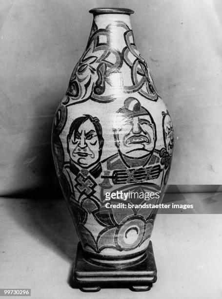 Caricatures of Hitler and Mussolini as they appear on the vase designed by Mr. And Mrs. Vyse. Photograph. February 1936.