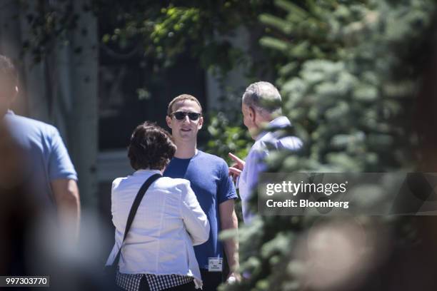 Mark Zuckerberg, chief executive officer and founder of Facebook Inc., center, speaks with Senate Minority Leader Chuck Schumer, a Democrat from New...