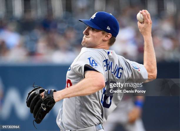 Ross Stripling of the Los Angeles Dodgers pitches during the first inning of a baseball game against the San Diego Padres at PETCO Park on July 12,...