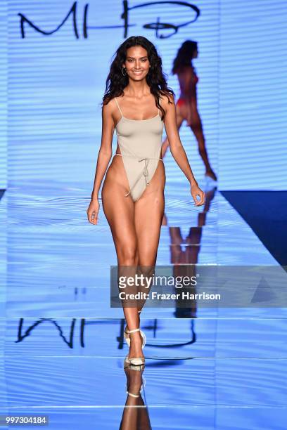 Model walks the runway for Monica Hansen during the Paraiso Fashion Fair at The Paraiso Tent on July 12, 2018 in Miami Beach, Florida.