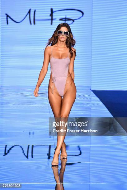 Model walks the runway for Monica Hansen during the Paraiso Fashion Fair at The Paraiso Tent on July 12, 2018 in Miami Beach, Florida.
