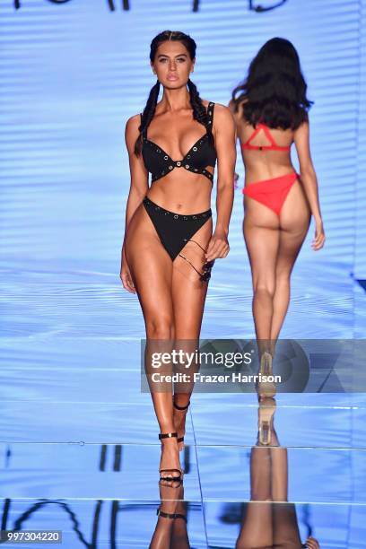 Model walks the runway for Monica Hansen during the Paraiso Fashion Fair at The Paraiso Tent on July 12, 2018 in Miami Beach, Florida.