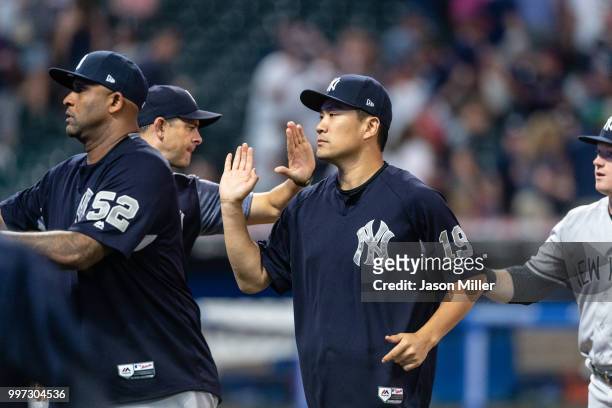 Masahiro Tanaka of the New York Yankees celebrates after the Yankees defeated the Cleveland Indians at Progressive Field on July 12, 2018 in...