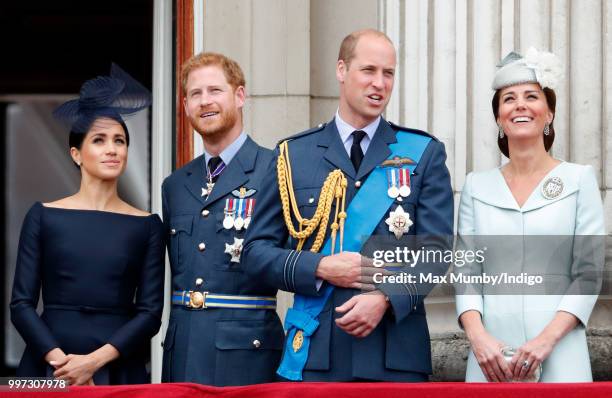 Meghan, Duchess of Sussex, Prince Harry, Duke of Sussex, Prince William, Duke of Cambridge and Catherine, Duchess of Cambridge watch a flypast to...