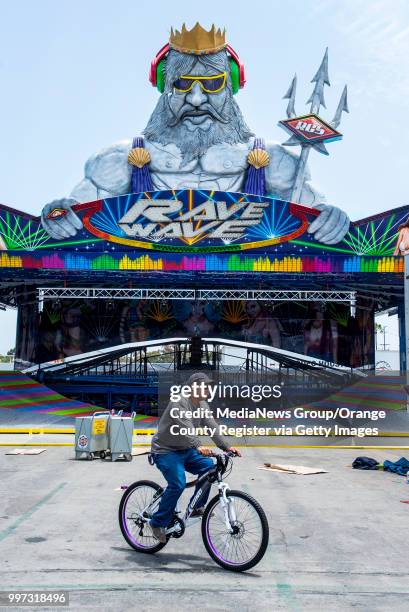 Worker rides by the Rave Wave with just days before the opening of the OC Fair on Tuesday, July 10, 2018. The fair opens Friday at the OC Fair &...