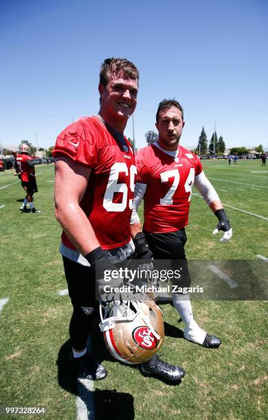 Mike McGlinchey and Joe Staley of the San Francisco 49ers stand on the field during the team Mini Camp at the SAP Training Facility on June 12, 2018...