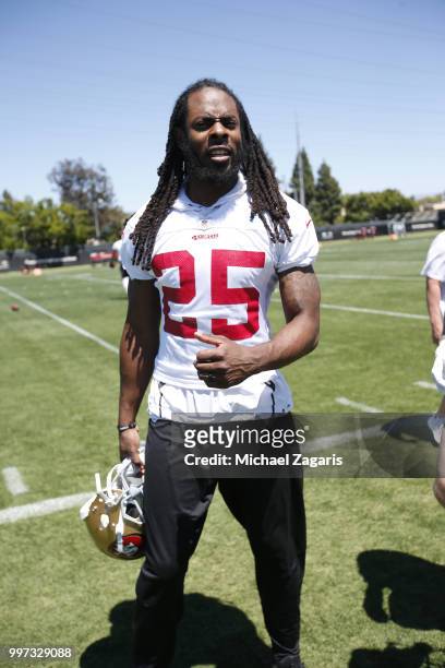 Richard Sherman of the San Francisco 49ers stands on the field during the team Mini Camp at the SAP Training Facility on June 12, 2018 in Santa...