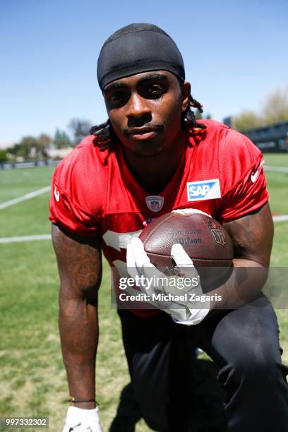 Jerick McKinnon of the San Francisco 49ers kneels on the field during the team Mini Camp at the SAP Training Facility on June 12, 2018 in Santa...