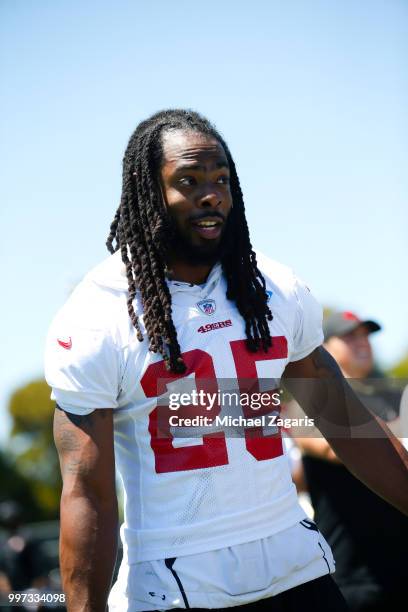 Richard Sherman of the San Francisco 49ers stands on the field during the team Mini Camp at the SAP Training Facility on June 12, 2018 in Santa...