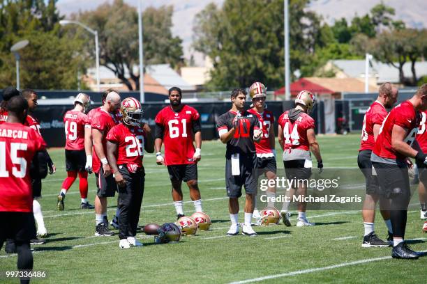 Jimmy Garoppolo of the San Francisco 49ers leads the offense through snap drills during the team Mini Camp at the SAP Training Facility on June 12,...