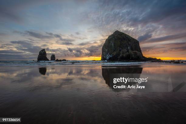 evening at haystack rock - jaye stock pictures, royalty-free photos & images