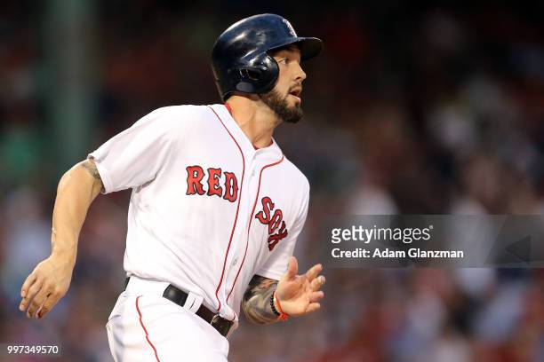 Blake Swihart of the Boston Red Sox runs to first base in the third inning of a game against the Texas Rangers at Fenway Park on July 10, 2018 in...