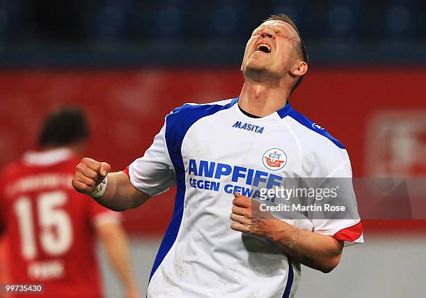 Enrico Kern of Rostock looks dejected during the Second Bundesliga play off leg two match between Hansa Rostock and FC Ingolstadt 04 at DKB Arena on...