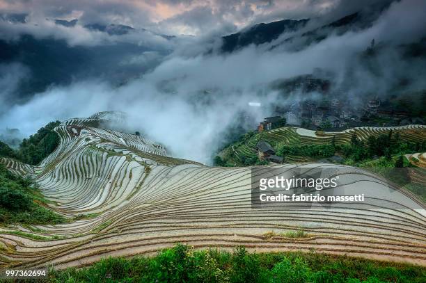the rice fields in longsheng - longsheng stock pictures, royalty-free photos & images