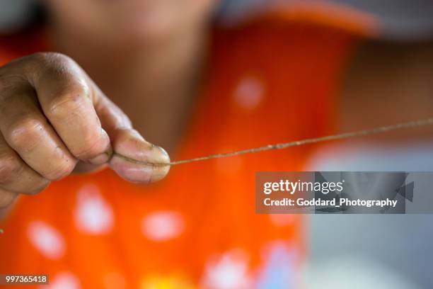 myanmar: lotus tecelagem - weaving - fotografias e filmes do acervo