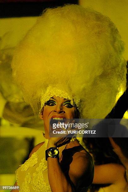 Transvestite performs at "Bar Oh!!!" during an event called "Time of Revolution" in San Jose, Costa Rica, on May 15, 2010. AFP PHOTO/Yuri CORTEZ