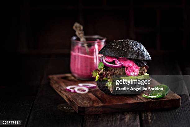 homemade black burger with berry aioli - aioli bildbanksfoton och bilder