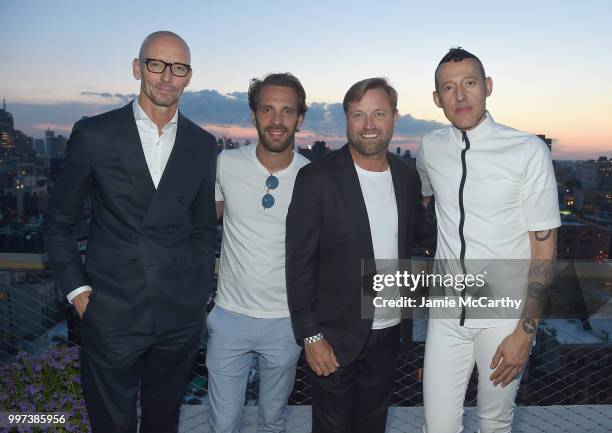 Chief Brand Officer Ingo Wilts, Jean-Eric Vergne, Alex Thomson and Karim Rashid attend the Champions Wear BOSS on July 12, 2018 in New York City.