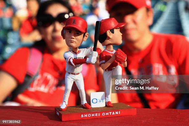 Detail of the Shohei Ohtani of the Los Angeles Angels of Anaheim bobblehead that was given to fans prior to a game against the Seattle Mariners at...