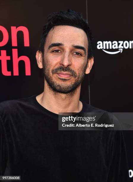 Amir Arison attends the premiere of Amazon Studios' "Generation Wealth" at ArcLight Hollywood on July 12, 2018 in Hollywood, California.