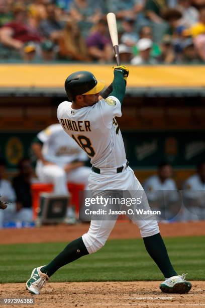 Chad Pinder of the Oakland Athletics at bat against the Cleveland Indians during the fourth inning at the Oakland Coliseum on July 1, 2018 in...