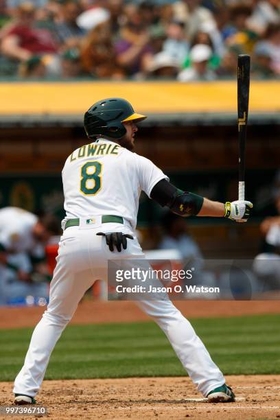 Jed Lowrie of the Oakland Athletics at bat against the Cleveland Indians during the third inning at the Oakland Coliseum on July 1, 2018 in Oakland,...