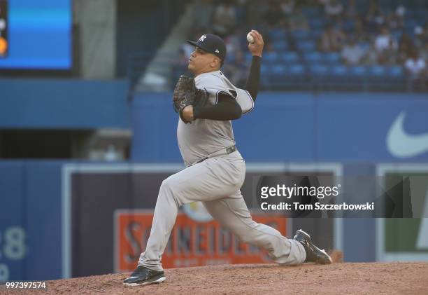 Dellin Betances of the New York Yankees delivers a pitch in the eighth inning during MLB game action against the Toronto Blue Jays at Rogers Centre...