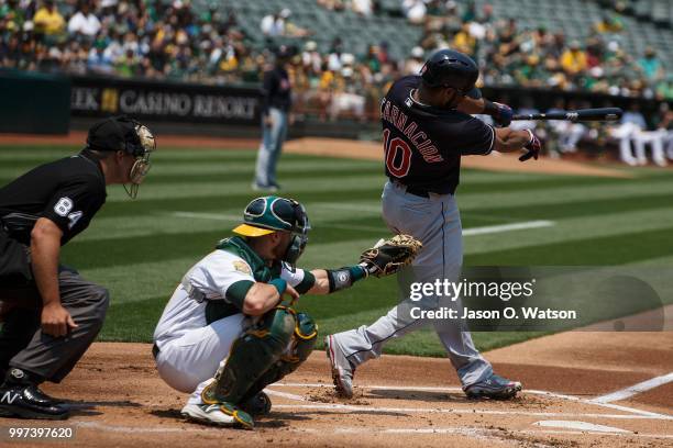 Edwin Encarnacion of the Cleveland Indians at bat against the Oakland Athletics during the first inning at the Oakland Coliseum on July 1, 2018 in...