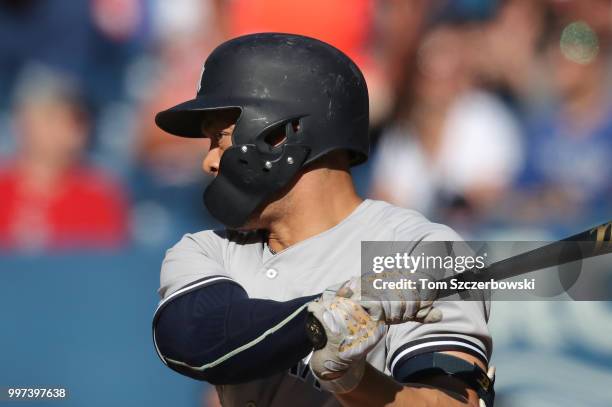 Giancarlo Stanton of the New York Yankees bats in the fourth inning during MLB game action against the Toronto Blue Jays at Rogers Centre on July 7,...