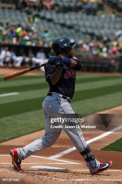 Jose Ramirez of the Cleveland Indians at bat against the Oakland Athletics during the first inning at the Oakland Coliseum on July 1, 2018 in...