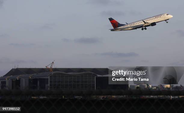 Delta plane takes off from Los Angeles International Airport on July 12, 2018 in Los Angeles, California. Delta announced today that it will increase...