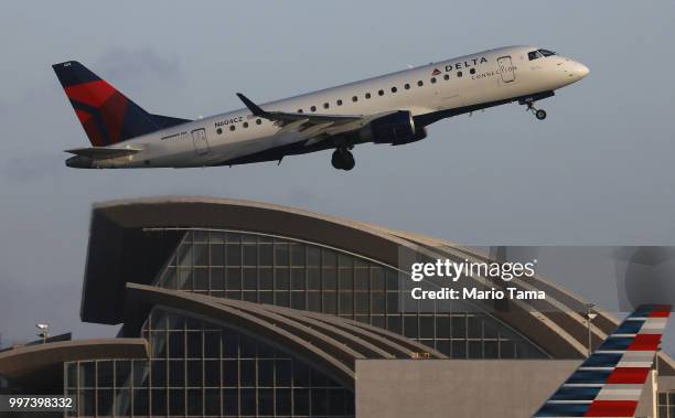 Delta plane takes off from Los Angeles International Airport on July 12, 2018 in Los Angeles, California. Delta announced today that it will increase...