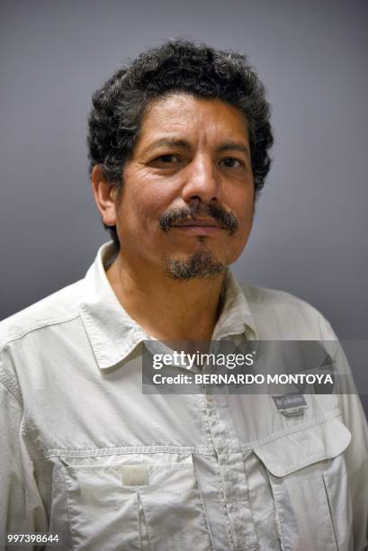 Photographer Yuri Cortez, who unwittingly became part of the celebrations of Croatia in their World Cup semi-final match against England, poses after...